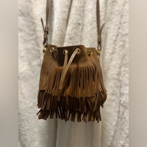 YSL fringe suede bucket bag